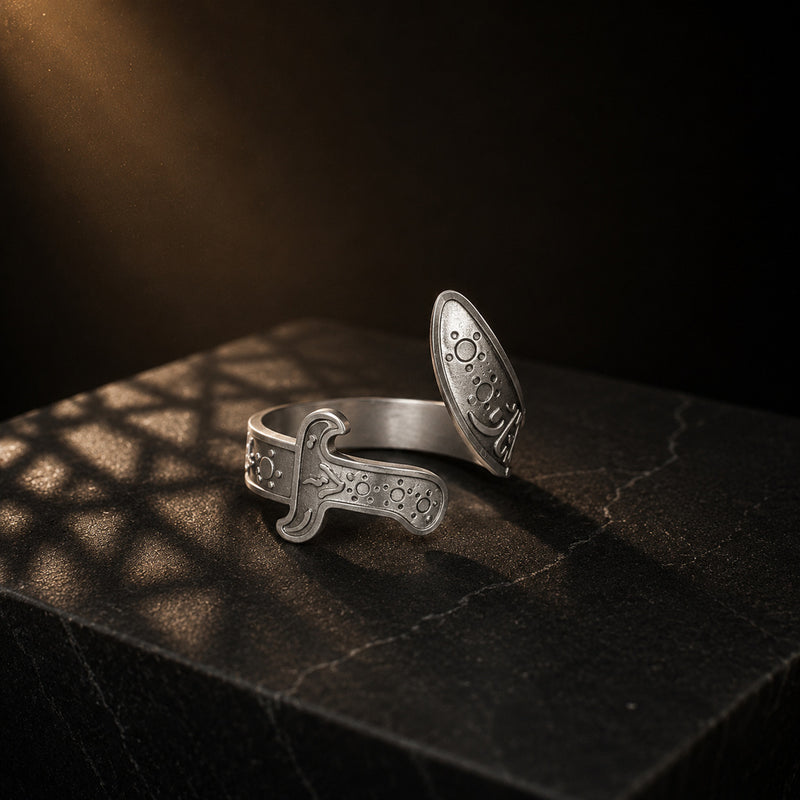 Zulfiqar ring, crossguard and lifted blade tip